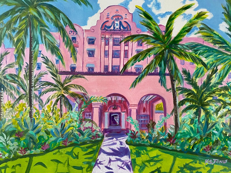 May include: A painting depicting a pink building with palm trees in front. The building has a large arched entrance and a clock tower. The palm trees are green and lush. The painting is in a realistic style.