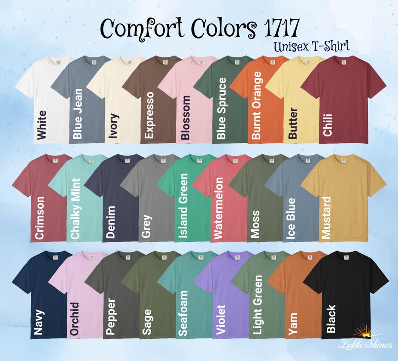 Op de afbeelding: Een display van Comfort Colors 1717 unisex t-shirts in verschillende kleuren, waaronder wit, blue jean, ivoor en zwart. De afbeelding toont een reeks tinten, van pasteltinten tot gedurfde tinten, waarbij elk shirt is gelabeld met zijn kleurnaam.