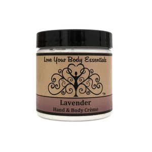 May include: A white jar with a black lid and a brown label. The label says "Love Your Body Essentials" and features a stylized tree with a woman inside. The jar also says "Lavender Hand & Body Cr&egrave;me".