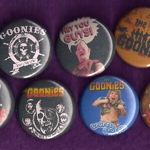 The Goonies 1" Pinback Buttons Set of 7 Cult Film 80's Comedy Sloth Chunk Never Say Die