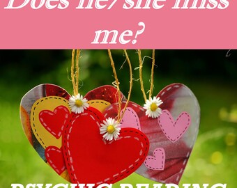 May include: Three heart-shaped decorations in red, yellow, and pink, each with a smaller heart design and a daisy. The hearts are suspended by twine against a blurred green background. Text at the top reads "Does he/she miss me?" and at the bottom, "PSYCHIC READING."