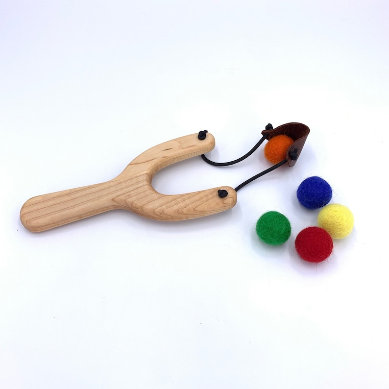 Natural solid maple hardwood children's toy slingshot and wool felt balls made in the USA by Treasures From Jennifer