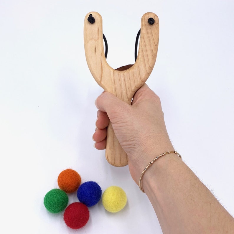 Natural solid maple hardwood children's toy slingshot and wool felt balls made in the USA by Treasures From Jennifer