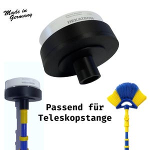 Könnte beinhalten: Ein schwarz-weißes Hekatron-Gerät mit zylindrischem Design, mit dem Text "Made in Germany". Das Bild zeigt auch eine blau-gelbe Teleskopstange und einen Bürstenkopf mit dem Text "Passend für Teleskopstange."