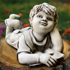 Concrete boy with book Cement guy sculpture Stone lying child decoration Garden boy figure Handmade patio art Outdoor reading boy statue