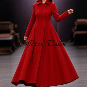May include: A floor-length, vibrant red coat featuring a double-breasted front with four matching buttons, a structured collar, long sleeves, and a flared, full-length skirt. The text "Officers Tailor" is visible across the center of the coat.