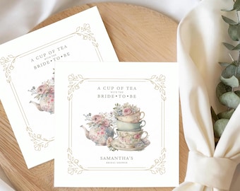 May include: Two square invitation cards with floral and tea-themed illustrations. The cards feature a teapot and stacked teacups with the text "A CUP OF TEA WITH THE BRIDE TO BE" and "SAMANTHA'S BRIDAL SHOWER" in gold lettering.
