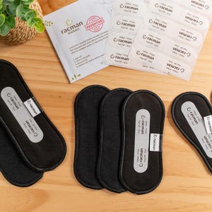 Wingless Reusable Daily Cloth Panty Liner (NOT Waterproof); 7-pack Black Organic Cotton (S, M, Thong) with Adhesive Strips, Washable Pad