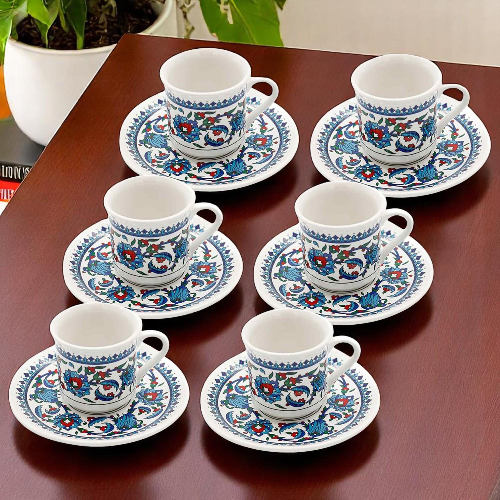 Quattro Tazze Da Portar Via Blu Scuro Con Un Supporto Di Tazza Immagine