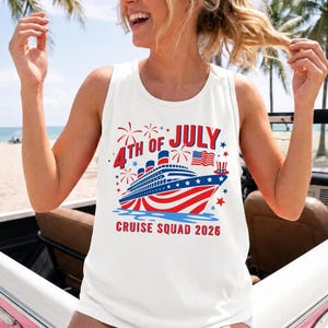 May include: A white sleeveless tank top featuring a graphic print of a cruise ship decorated with red, white, and blue stripes. The text reads 4TH OF JULY CRUISE SQUAD 2026, accompanied by illustrations of fireworks, a small American flag, and a top hat.