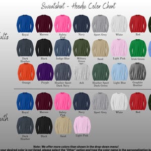 May include: Color chart for sweatshirts and hoodies, featuring a variety of colors for adults and youth. Colors include royal blue, maroon, safety pink, navy, sport grey, white, red, and forest green. The chart also includes text that says "Sweatshirt - Hoodie Color Chart".