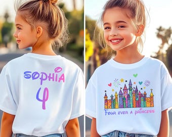 May include: White t-shirt with a colorful castle graphic and the text "Four ever a Princess." The back of the shirt has the name "Sophia" and the number "4" in a gradient color scheme. The girl is wearing blue jeans.