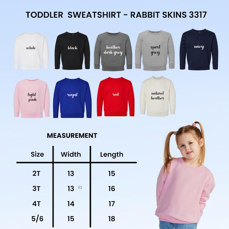 May include: A selection of toddler sweatshirts in various colors, including white, black, and navy. The image displays the sweatshirts with the text "TODDLER SWEATSHIRT - RABBIT SKINS 3317". A measurement chart shows sizes 2T to 5/6 with width and length in inches.