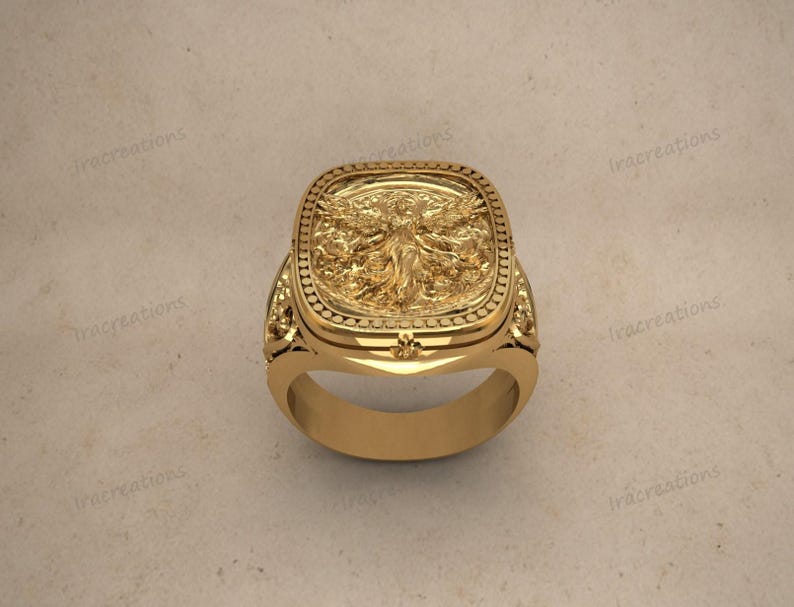 Oxidized antique style angel ring with rectangular frame.