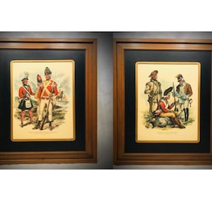 May include: A handmade wooden sign with the text "Welcome to our home" in a handwritten style. The sign is painted white with a dark stained frame. A small green plant is placed on the sign.