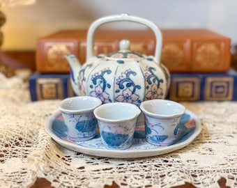 Juego de té de porcelana china en miniatura: diseño de loto pintado a mano