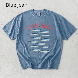 May include: Blue jean coloured t-shirt featuring the word "SARDINES" in red above a graphic of sardines. The shirt has a crew neck and short sleeves. The text "Blue Jean" is in the upper left corner.