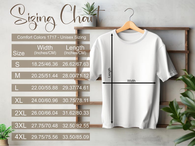 May include: White t-shirt hanging on a wooden rack, displaying a sizing chart. The chart includes measurements in inches and centimetres for sizes S through 4XL. The text reads "Sizing Chart" and "Comfort Colors 1717 - Unisex Sizing."