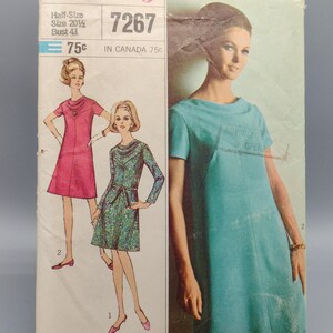 May include: Vintage Simplicity sewing pattern 7267 for designer fashion dresses. The cover features illustrations of three different dress designs in pink, green, and teal. The pattern includes sizing information and the price.