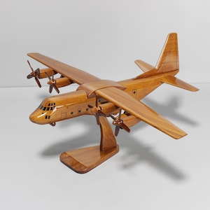 Herc Aircraft Wood Model – a true workhorse of the skies - Fat Albert - Angel Transport Plane Collectible