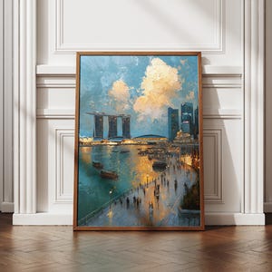 May include: A framed art print depicting a cityscape with a body of water, boats, and people. The artwork features a warm color palette with blues, oranges, and yellows. The buildings and sky are painted with visible brushstrokes, creating a textured effect.