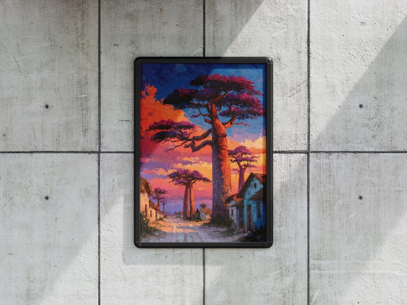 Puede incluir: Una impresi&oacute;n art&iacute;stica enmarcada que representa un paisaje vibrante con grandes &aacute;rboles de baobab bajo un cielo colorido al atardecer. La obra presenta una carretera bordeada de peque&ntilde;os edificios, pintados en tonos naranja, morado y azul.