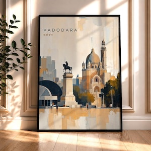 May include: A framed wall art print featuring a stylized illustration of Vadodara with the text VADODARA and its Hindi script equivalent. The artwork depicts a central equestrian statue on a pedestal, a large domed building, and trees.