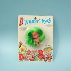Hasbro Flutter Byes Miniature 1974 Heavenly Pixie Green Hair and Wings * Rare MIP Packaging Bad Shape