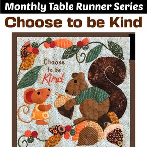 May include: A quilted table runner with a blue background and a brown, green, and orange patchwork design. The center of the runner features a squirrel and a mouse with the text "Choose to be Kind".