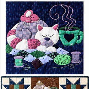 May include: A fabric table runner featuring the text Monthly Table Runner Series Cozy Places. The design includes a white cat sleeping on a quilt next to a green mug with a heart, a pink mouse, spools of thread, and a pincushion. The runner has star-shaped quilt blocks on the ends.