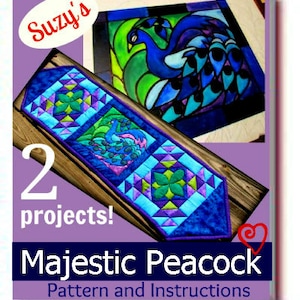May include: A purple and blue peacock quilt pattern with instructions. The pattern includes two projects: a table runner and a pillow. The quilt pattern features a peacock with a blue body and green and blue tail feathers.