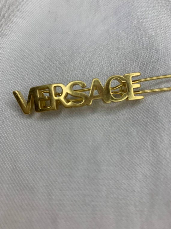 Versace “VERSACE” Gold Hair Clip – Authentic Designer Hair 