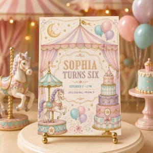 May include: A rectangular invitation card featuring a pastel carnival theme with a carousel horse, a multi-tiered cake, and balloons. The text reads: SOPHIA TURNS SIX, SEPTEMBER 12 - 2 PM, LITTLE STAR HALL - CHICAGO, IL. The design includes a crescent moon.
