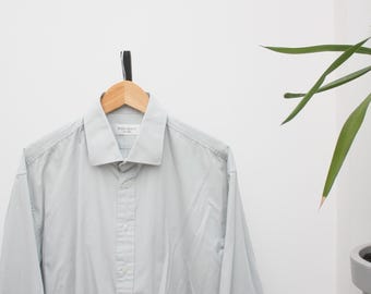 イヴ・サンローランのライトブルーのロングスリーブヴィンテージシャツ