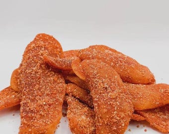 Fette di mango premium piccanti e acidule con pepe di Cayenna e paprika, snack agrodolce Halal