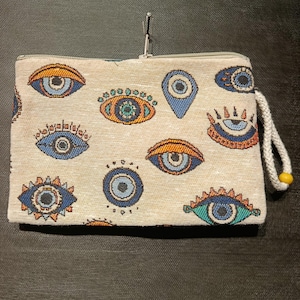 Bolso de mano con símbolo de protección, estilo gobelino, hecho a mano, estilo bohemio con motivo de talismán.