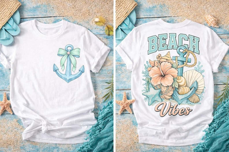 May include: White t-shirts with beach-themed designs. One shirt features a blue anchor with a bow, the other has the words "Beach Vibes" with an anchor, flowers, and seashells. Both shirts are short-sleeved.