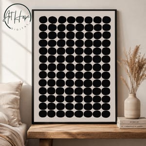 May include: A rectangular wall art print in a black frame featuring a grid pattern of solid black circles on a light beige background. The text Art Hope DIGITAL is visible in the upper left corner of the image, presented in a circular logo format.