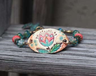 Boho flower...Charm Bracelet Bohemian style...pops of rustic barn red... coral greens browns and turquoise.