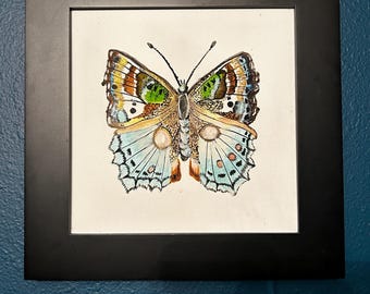 Ręcznie malowany motyl akwarelowy: lśniąca sztuka piórem i tuszem