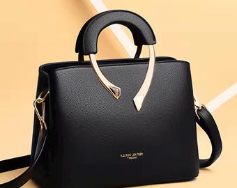 Bolso bandolera 2026 para mujer, bolso mediano de piel sintética, cierre de cremallera, bolso de hombro para uso diario.