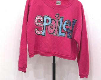Sudadera corta rosa con estampado de los 90 y diseño "Freeze Spoiled" Talla única