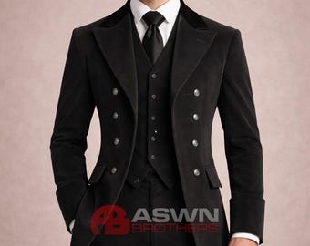 May include: A black three-piece suit with a long coat, vest, and trousers. The coat features a double-breasted design with silver buttons. The suit is paired with a white dress shirt and black tie. The brand logo "ASWN BROTHERS" is visible.