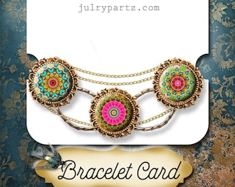 Peut inclure: Une carte de bracelet avec le texte "Julry Partz julrypartz.com Bracelet Card" et trois breloques colorées de style mandala sur une chaîne dorée.
