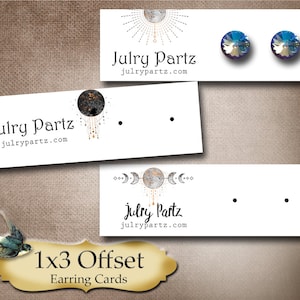 May include: White earring cards with a celestial moon and stars design. The cards have the text "Julry Partz" and "julrypartz.com". The cards are 1x3 offset earring cards.