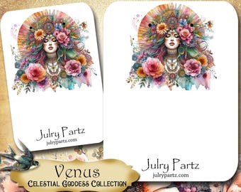 Peut inclure: Deux cartes blanches aux coins arrondis présentent une illustration à l'aquarelle d'une femme ornée de fleurs et d'une coiffe colorée. Les cartes portent le texte "Julry Partz" et "Venus Celestial Goddess Collection".