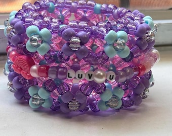 Mini brazalete Kandi con brillantina rotatoria