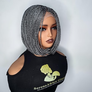 Bob braid wig made on lace closure showing the side view of the wig. The Color is  gray and the length is 10 inches.