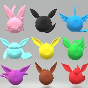 May include: Nine colourful, stylised 3D-printed figures, each with a spherical body and distinctive ear-like or fin-like appendages. The figures are in various colours, including pink, black, blue, yellow, green, purple, brown, and red.