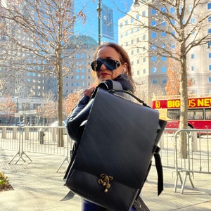 Fidi Backpack / Black veg tan leather / expandable / adjustable / made by hand